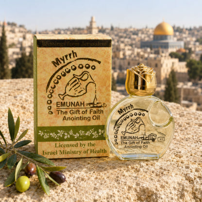 Myrrh anointing oil bottle and box on Jerusalem stone background